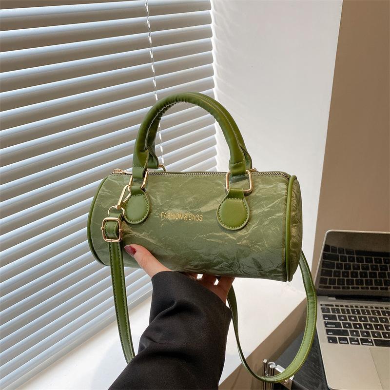 Niche design cylinder handbag new temperament versatile high sense messenger bag fresh and sweet shoulder bag