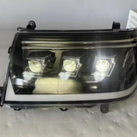 Compatible with Toyota Land Cruiser LC100 1998-2007 Headlight Assembly with LED Daytime Running Lights and Turn Signals.