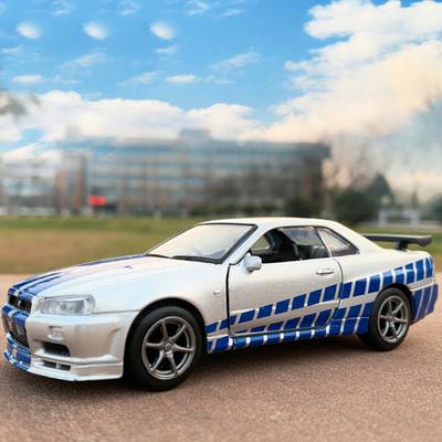 Alta simulación 1:36 Nissan GTR R34 Skyline Ares Diecasts y vehículos de juguete Metal el modelo de coche rápido y furioso juguetes para niños
