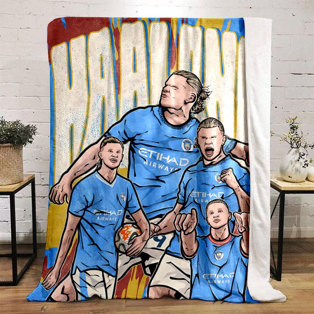 Group of athletes in blue jerseys with bold text and vibrant backdrop. for all seasons blanket lunch break throw gift