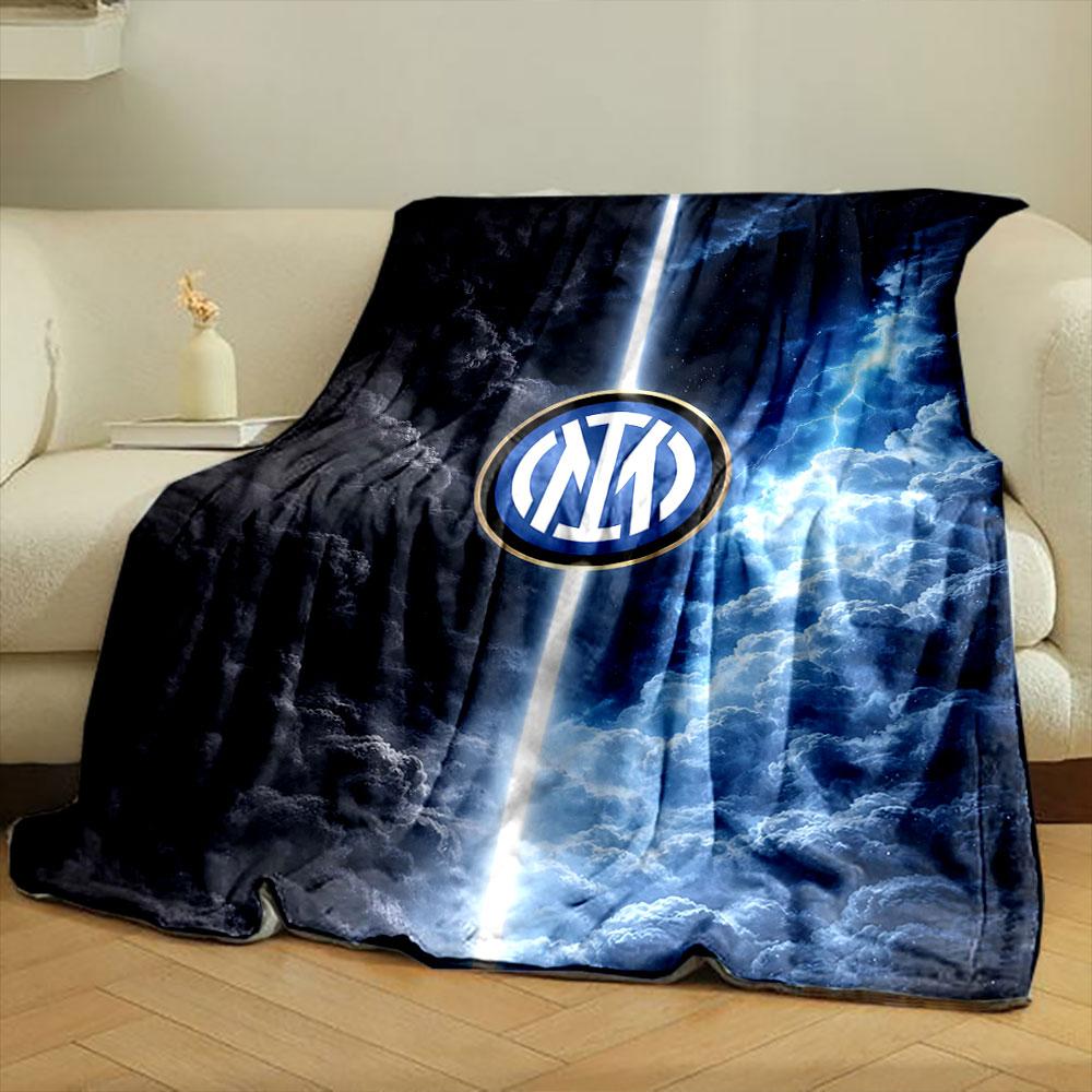 A vertical beam splits dark clouds on the left and bright storms on the right. for all seasons blanket lunch break throw gift