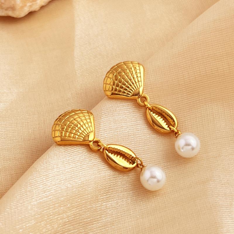 

Позолоченные 18-каратным золотом серьги-кисточки с подвеской в виде морской звезды и ракушки