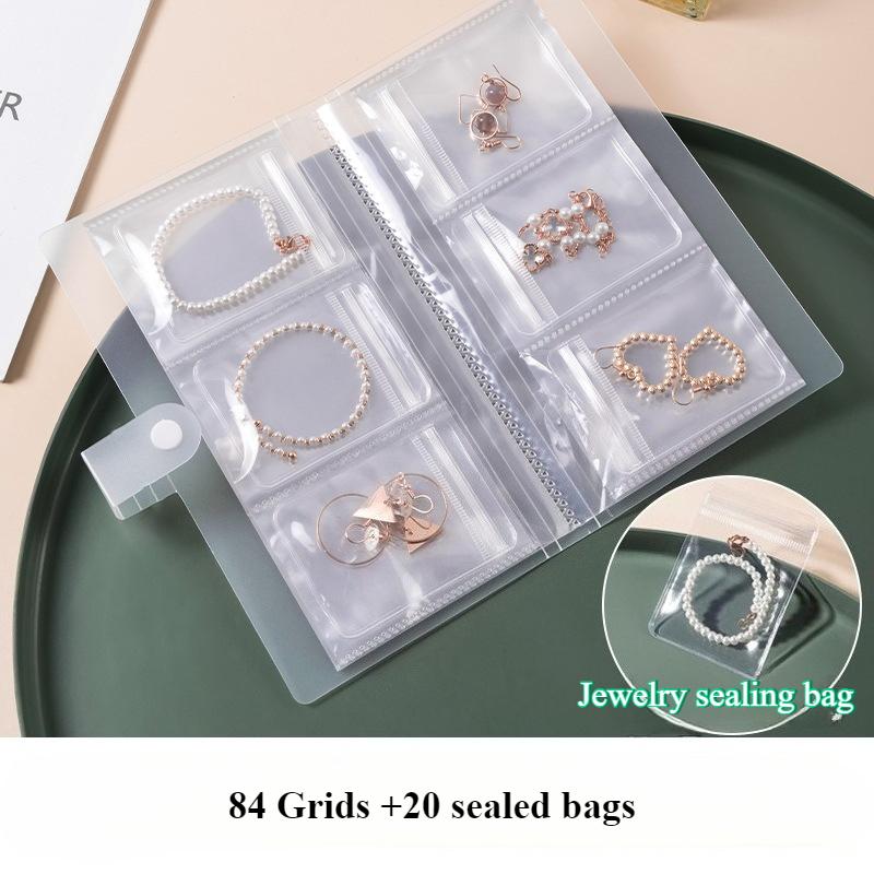 Portable Jewelry Organizer Album with Transparent Pockets-Organizer for Earrings,Rings,Necklaces-Anti-Oxidation Zipper Seal Bag.