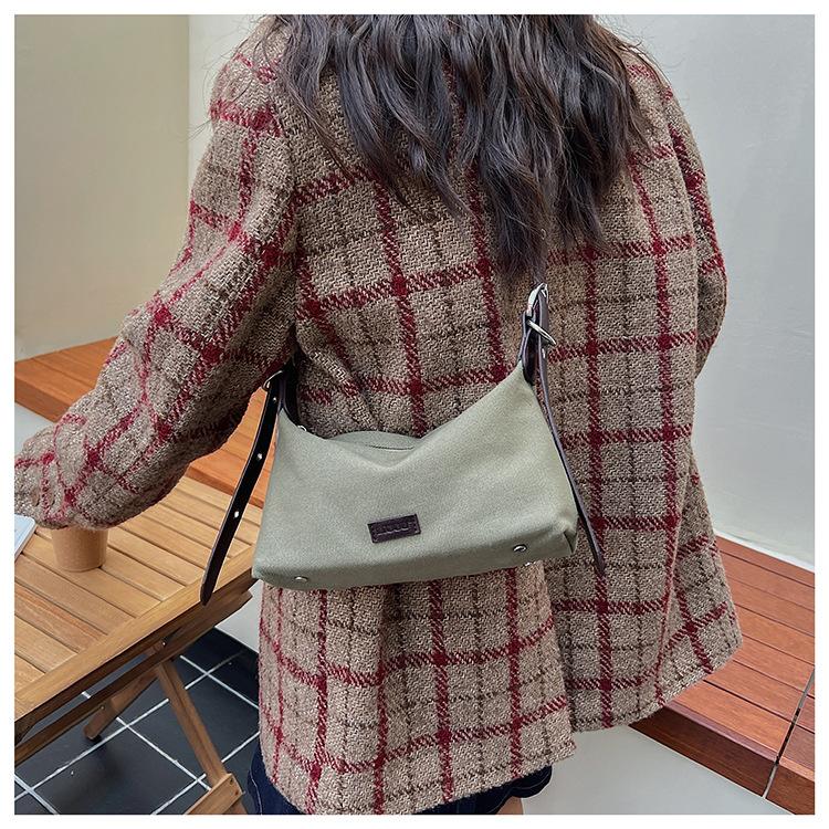 Premium Sense Niche Canvas Bag Women's Autumn and Winter Leisure Shoulder Messenger Bag Commuter Dumpling Bag