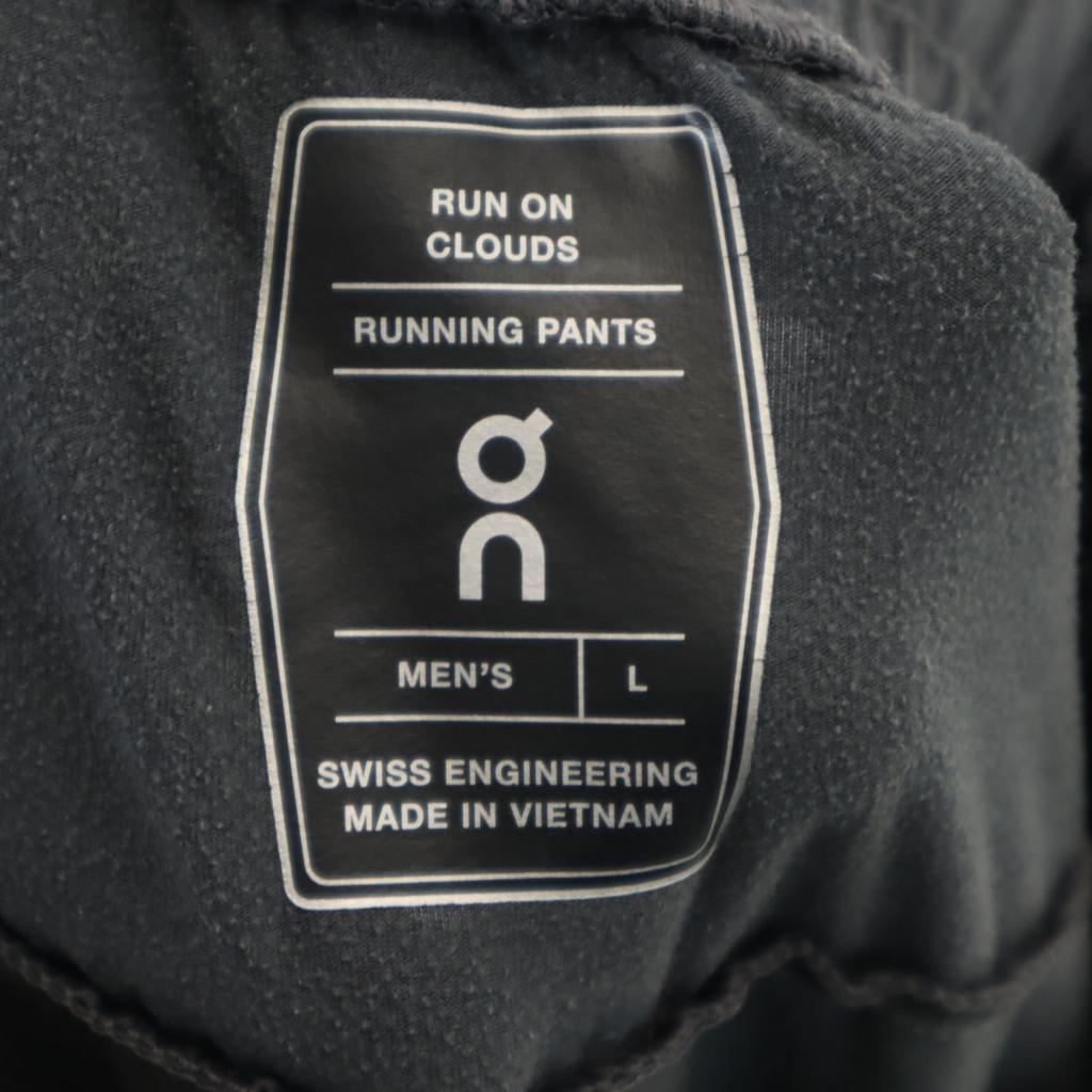 QN běžecké kalhoty L Zelený systém Pánské Použité