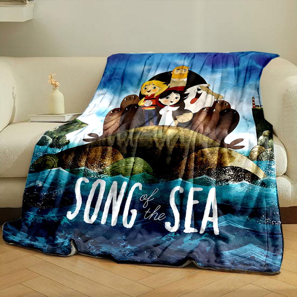 A colorful animated scene with people, seals, and a sea turtle over waves. for all seasons blanket lunch break throw gift