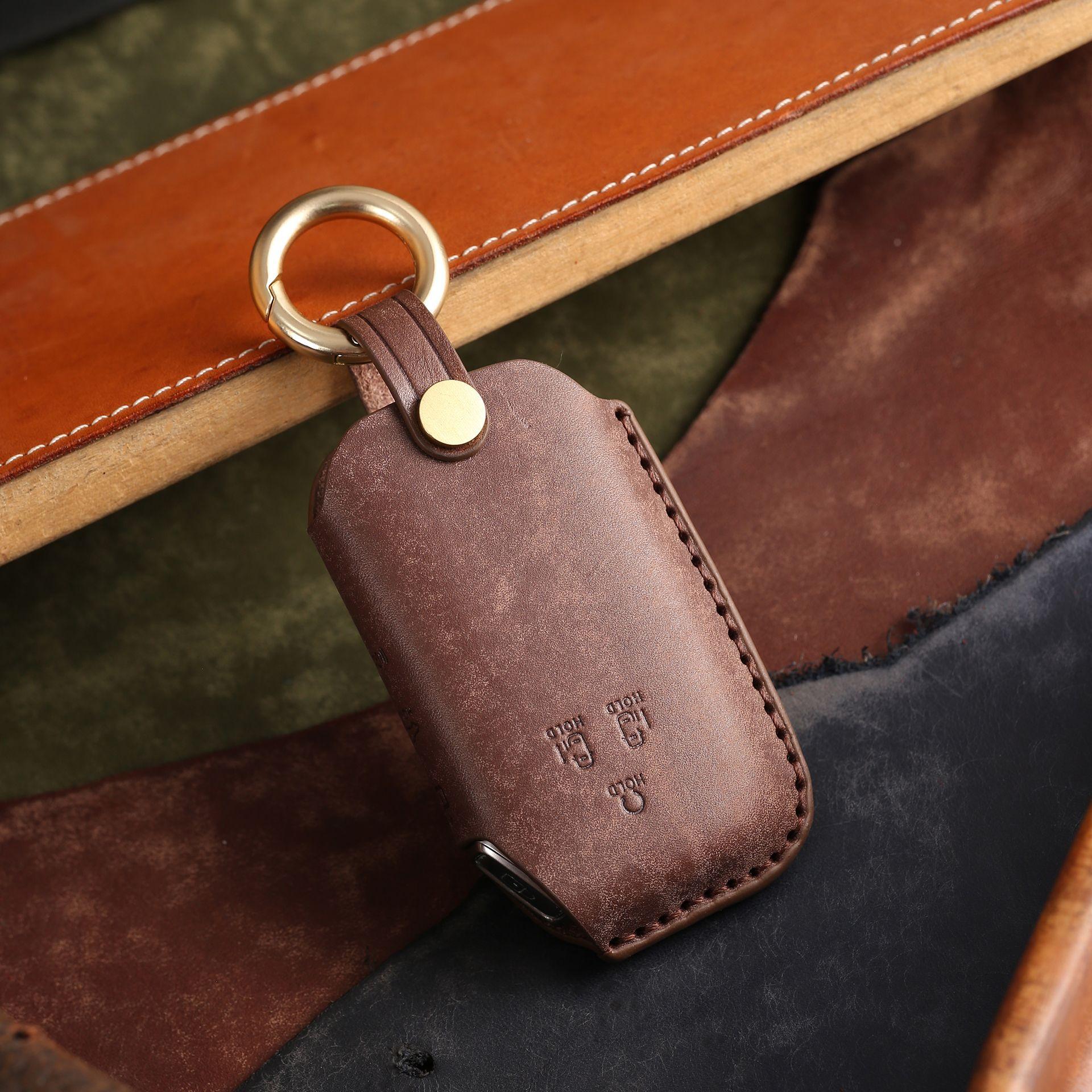 

Suitable for high-end interior modification of Kia Jiahua key cover first layer real cowhide business car protective shell buckle коричневый
