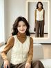 New women's down cotton vest in autumn and winter, piled and thickened to keep warm, wearing short V-neck sleeveless vest