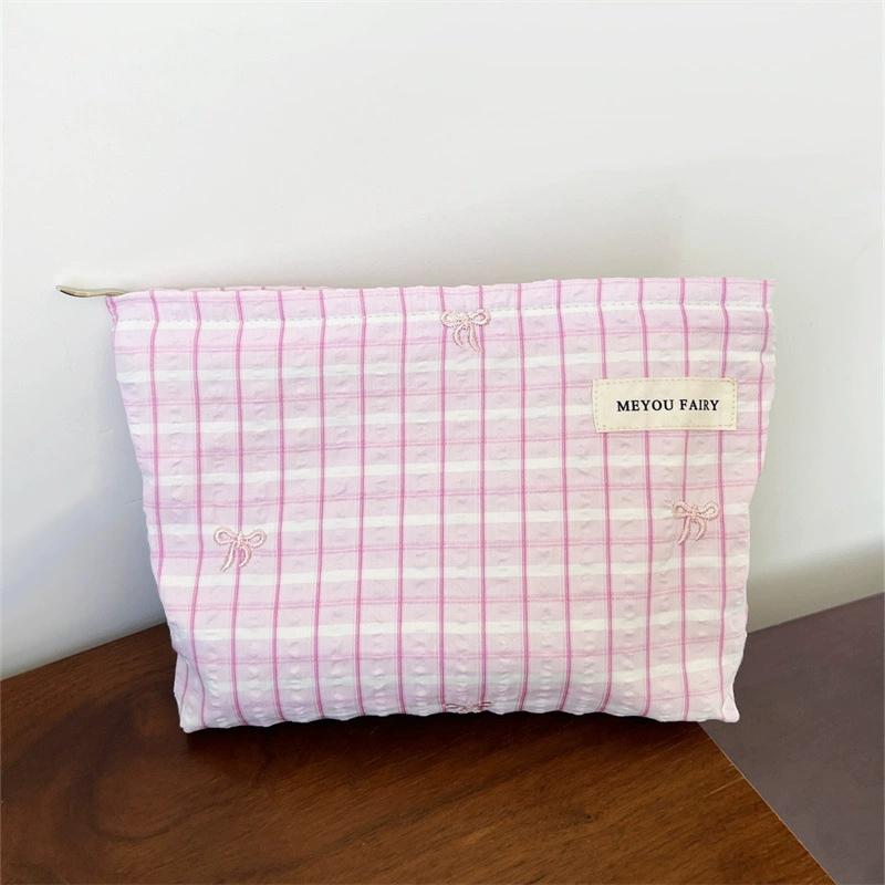 Blue and White Striped Bow Embroidered Makeup Bag, Zippered Storage Bag, Portable Travel Cosmetics and Skincare Storage Bag