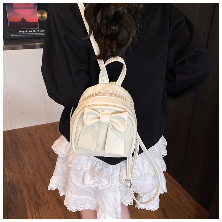 Sac à dos en cuir synthétique style coréen avec nœud papillon pour femme Sac à bandoulière matelassé léger