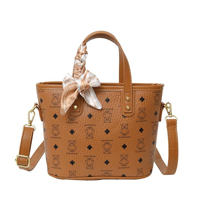 

2025 new handbag bag women s design silk scarf shoulder bucket bag commuter versatile fashion printed messenger bag