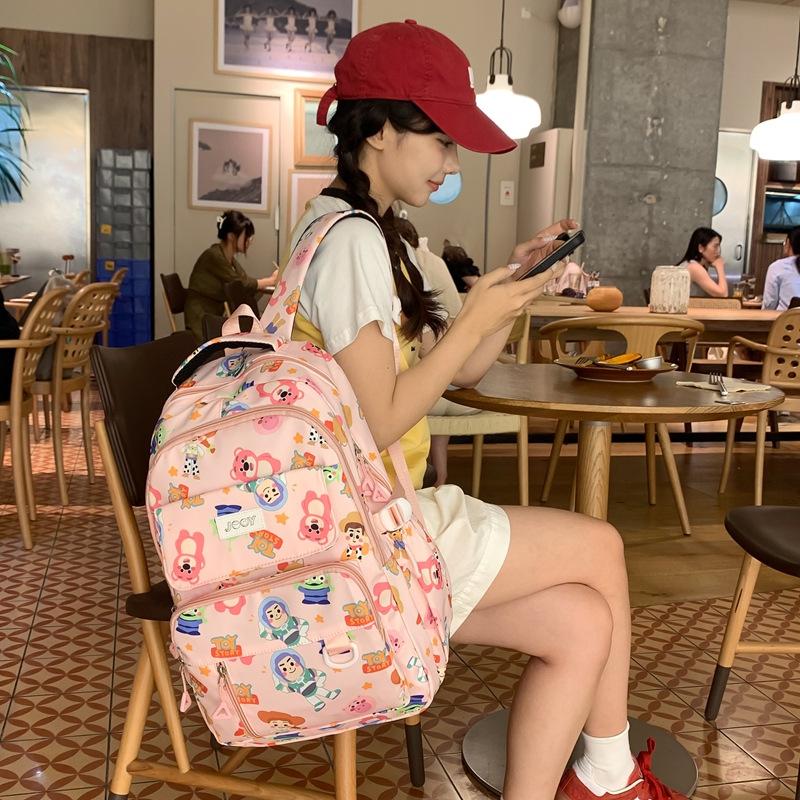 Fashion Korean version lightweight backpack girls cute print going out leisure backpack large capacity primary and secondary school student schoolbag