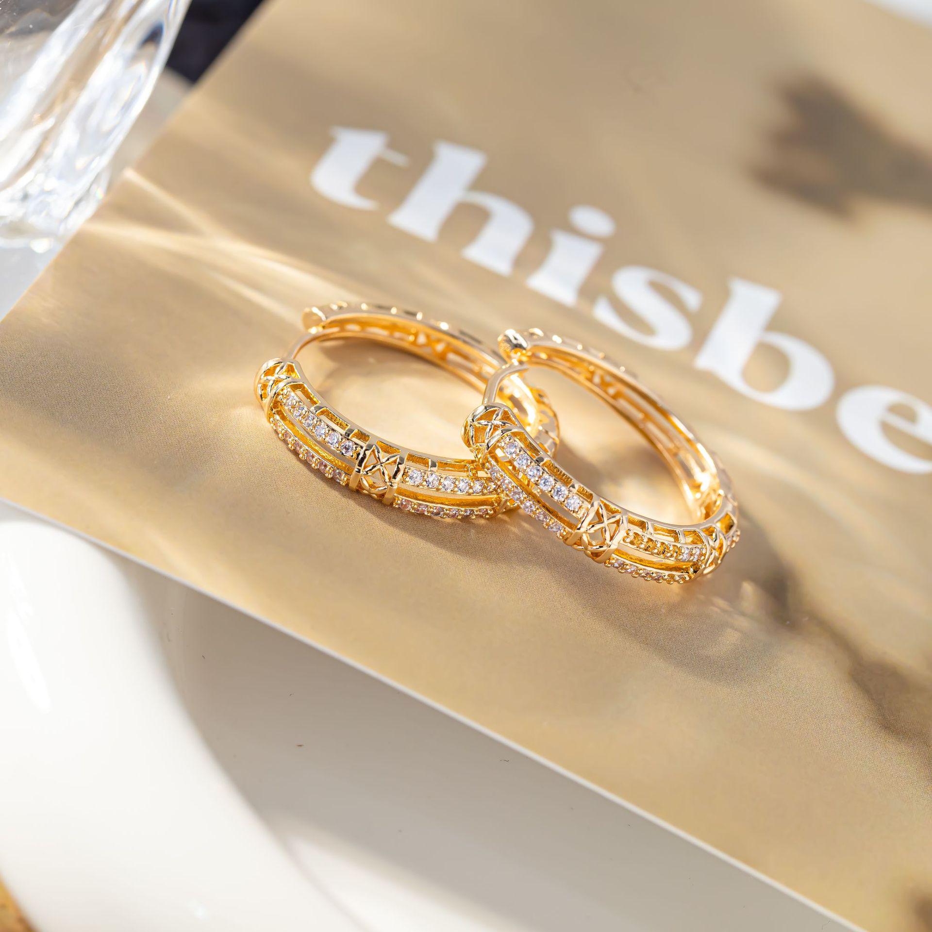 Elegant Hollow Floral Zirconia Hoop Earrings: High-End, Super Shiny, and Stylish.