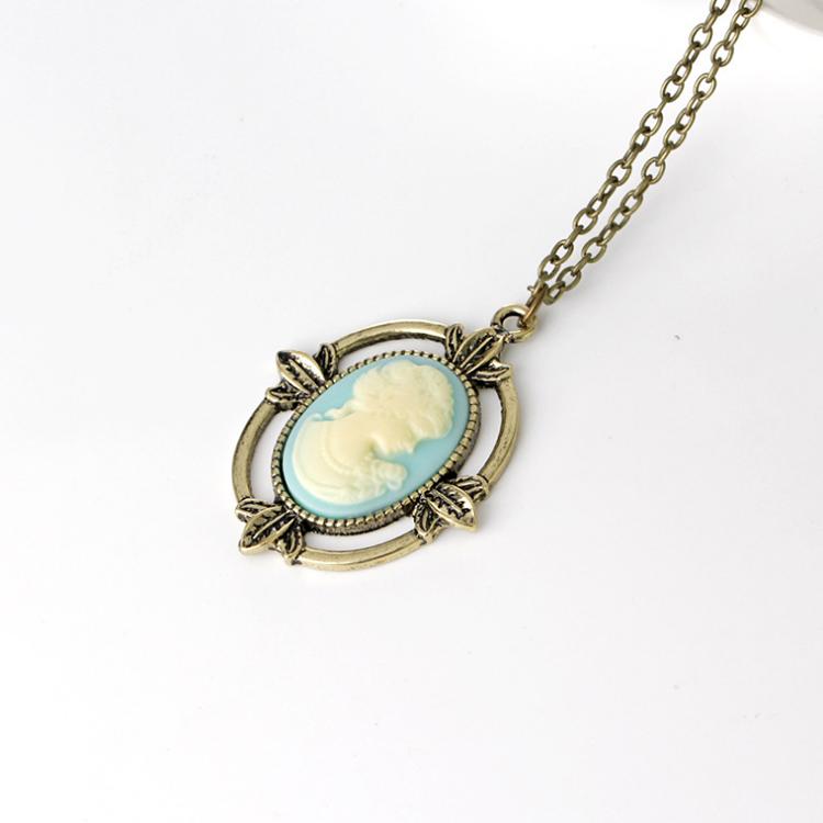 Nový Vintage styl bronzový světle modrý náhrdelník Cameo The Vampire Diaries Náhrdelník s přívěskem Katherine Beauty Head pro ženy