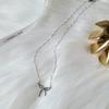 L’OMBRILLANT New Year Ribbon Surgical Necklace