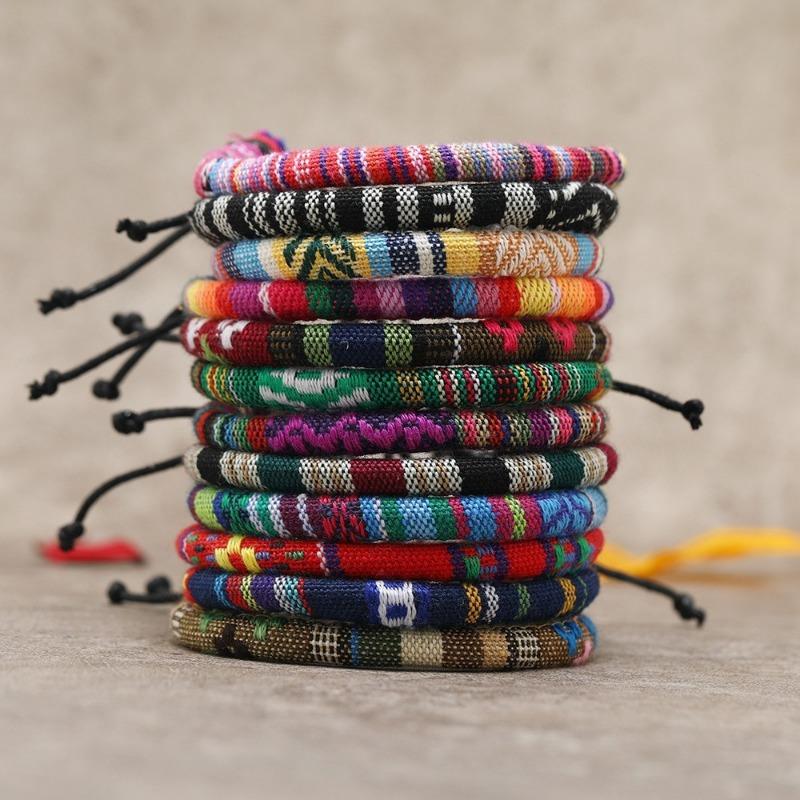 

Hot-selling cotton men s and women s bohemian hand-woven bracelets, 12-piece set, colorful surf bracelets різнокольоровий