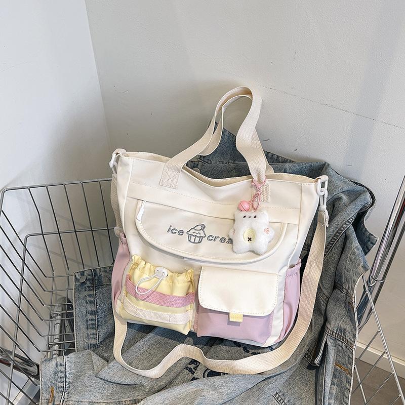 

Large capacity shoulder bag female Japanese cute girl contrasting color messenger bag student tutoring class bag commuter tote bag