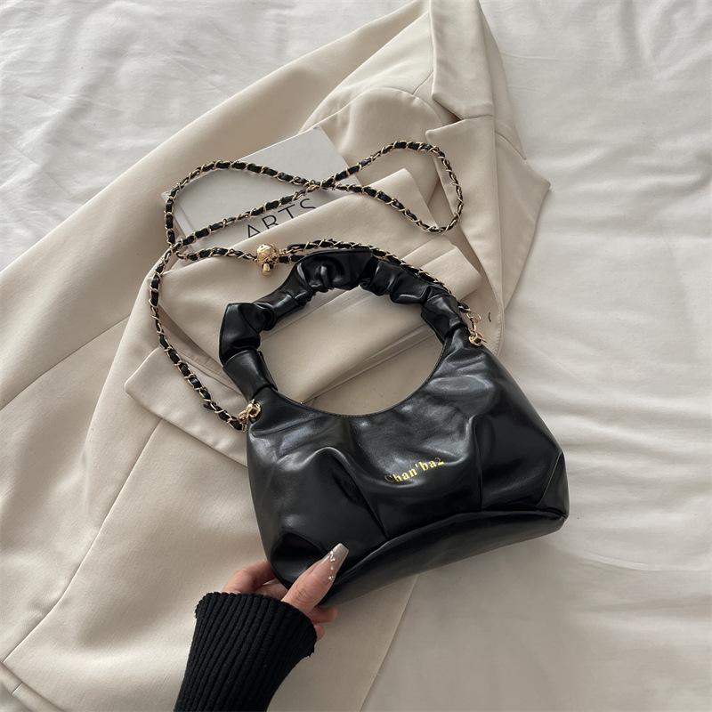 

Niche soft leather pleated portable dumpling bag women s new simple solid color casual chain crossbody cloud bag