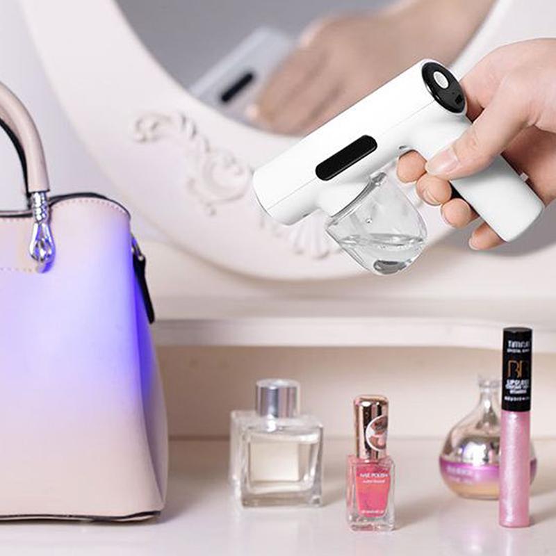 Tragbare Hand-Elektro-Befeuchtungssprühpistole Haushalts-Reisebedarf Zerstäubtes Blaues Licht Wiederaufladbare Desinfektionspistole