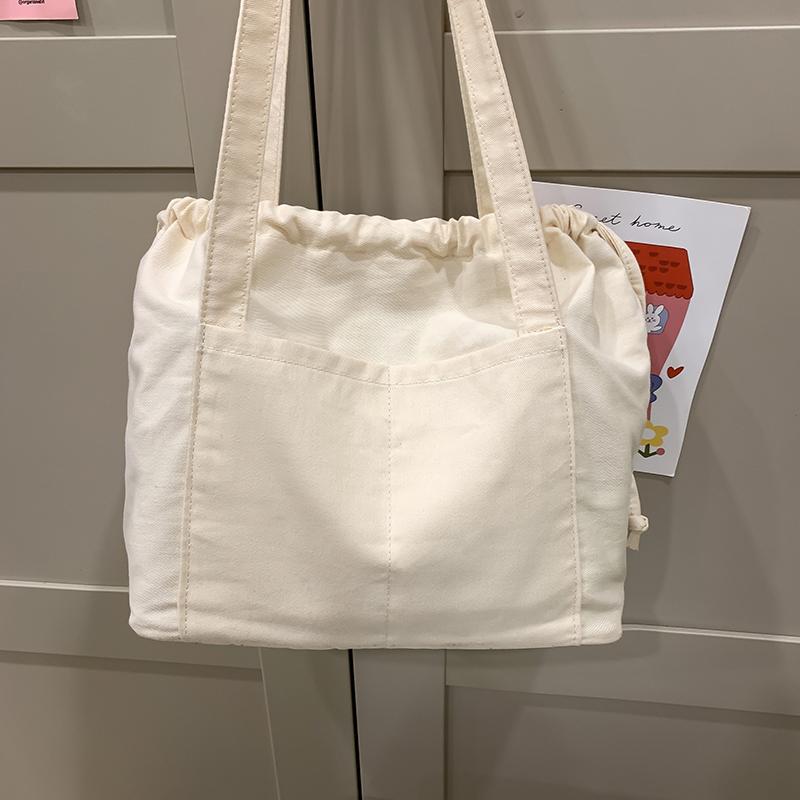 Джинсовая сумка женская сумка через плечо с завязками большая вместительная сумка-тоут — фото 15