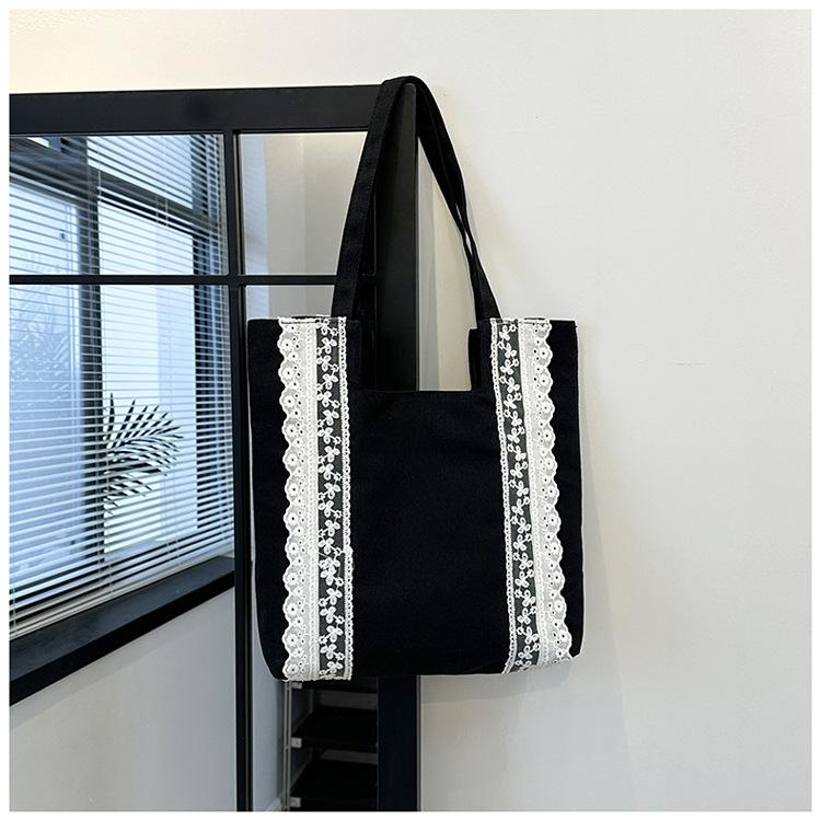 Koreansk stil enkel och stor kapacitet 2025 sommar ny axelväska utländsk stil mode toteväska för pendling spetsväska