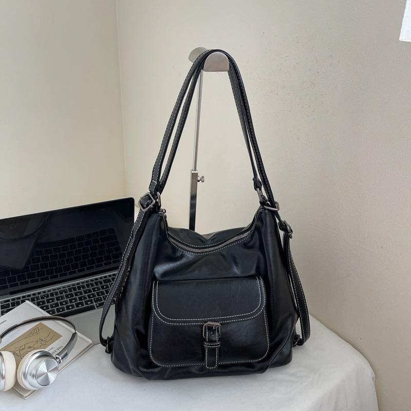 Casual large capacity retro bag women 2025 new versatile shoulder bag double shoulder backpack commuter bucket bag