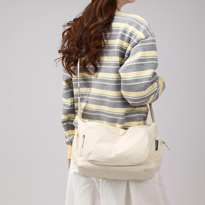

Solid color casual messenger bag large capacity anti-splashing messenger bag trendy brand versatile student class bag nylon messenger bag белый