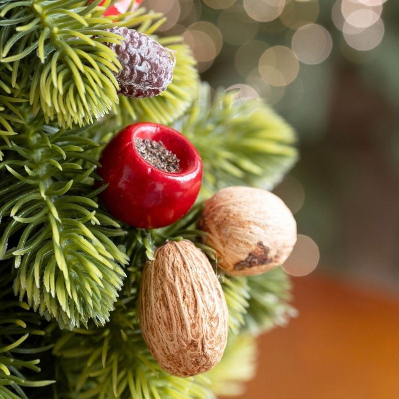 Ready-to-Display Mini Christmas Tree with Integrated Base, Soft Finish, and Arranged Seasonal Decorations for Indoor Use