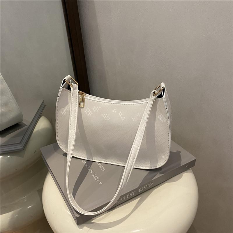 This year's popular bag women's 2025 new trendy fashion Korean version portable small square bag foreign gas snake pattern shoulder armpit bag