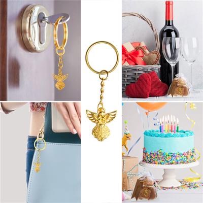 120 Andělských klíčenek s bílými sáčky a visačkami s nápisem Děkuji Dárkové sady na křtiny miminka Perfektní klíčenky na baby shower párty