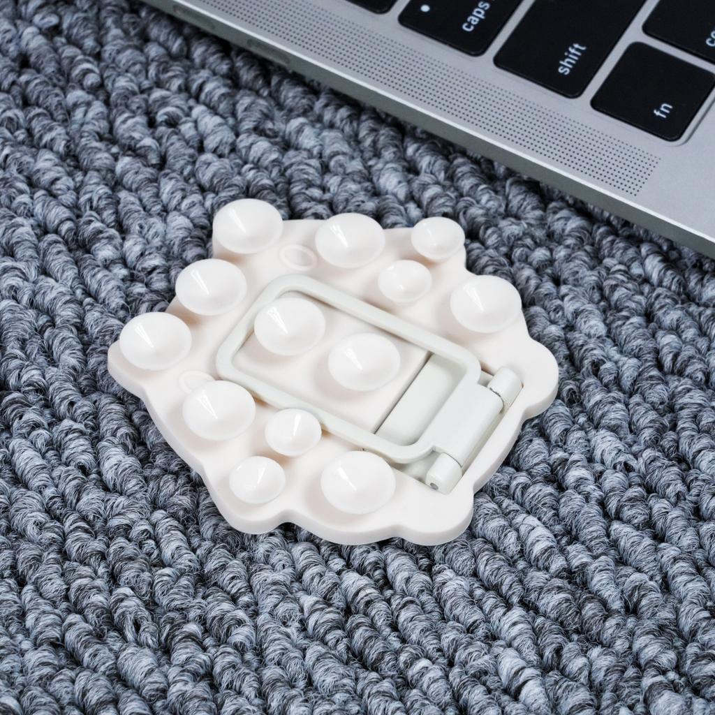 Hexagonal silicone suction cup mobile phone holder, lazy artifact, portable magnetic suction multi-function universal folding desktop holder