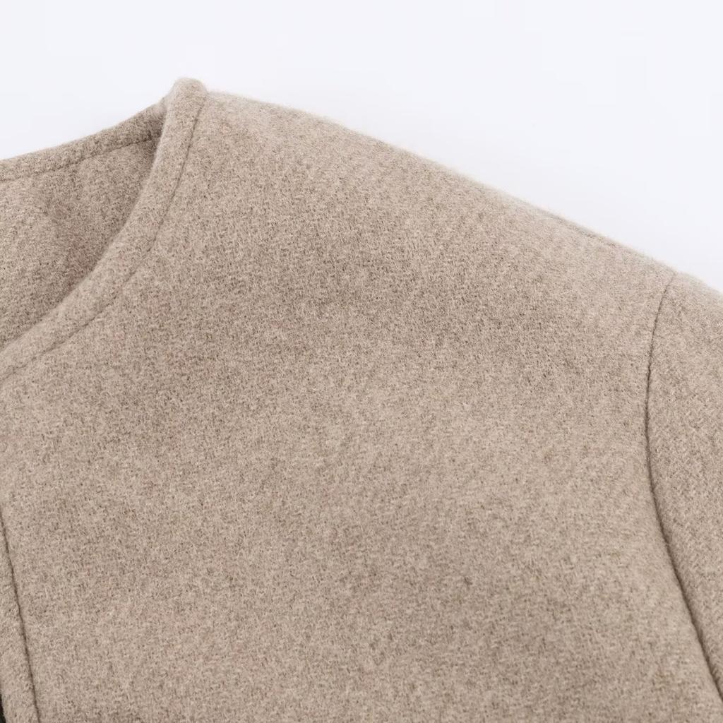 Foreign trade autumn and winter new women's clothing European and American style fashion simple leather effect decoration layer long sleeve woolen ja