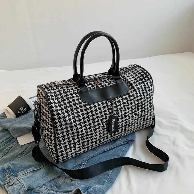 

New travel bag, duffel bag, fitness sports bag, large-capacity business trip boarding bag, swimming bag, accommodation bag, travel bag.