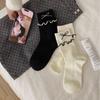Milk White Medium Tube Socks Women'S College Style Stacking Socks Bow Fungus Edge Socks