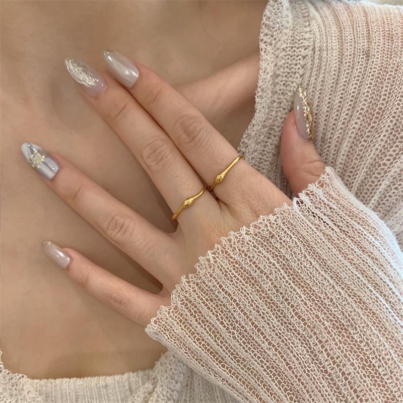 Vintage Gold-Plated Stackable Ring: Personalized Convex Corner with Single Loop - European & American Niche Fashion Style for Women.