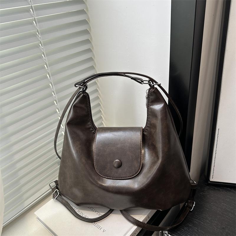 

Multifunctional backpack women s large-capacity autumn and winter new Korean version retro versatile commuter student class shoulder bag