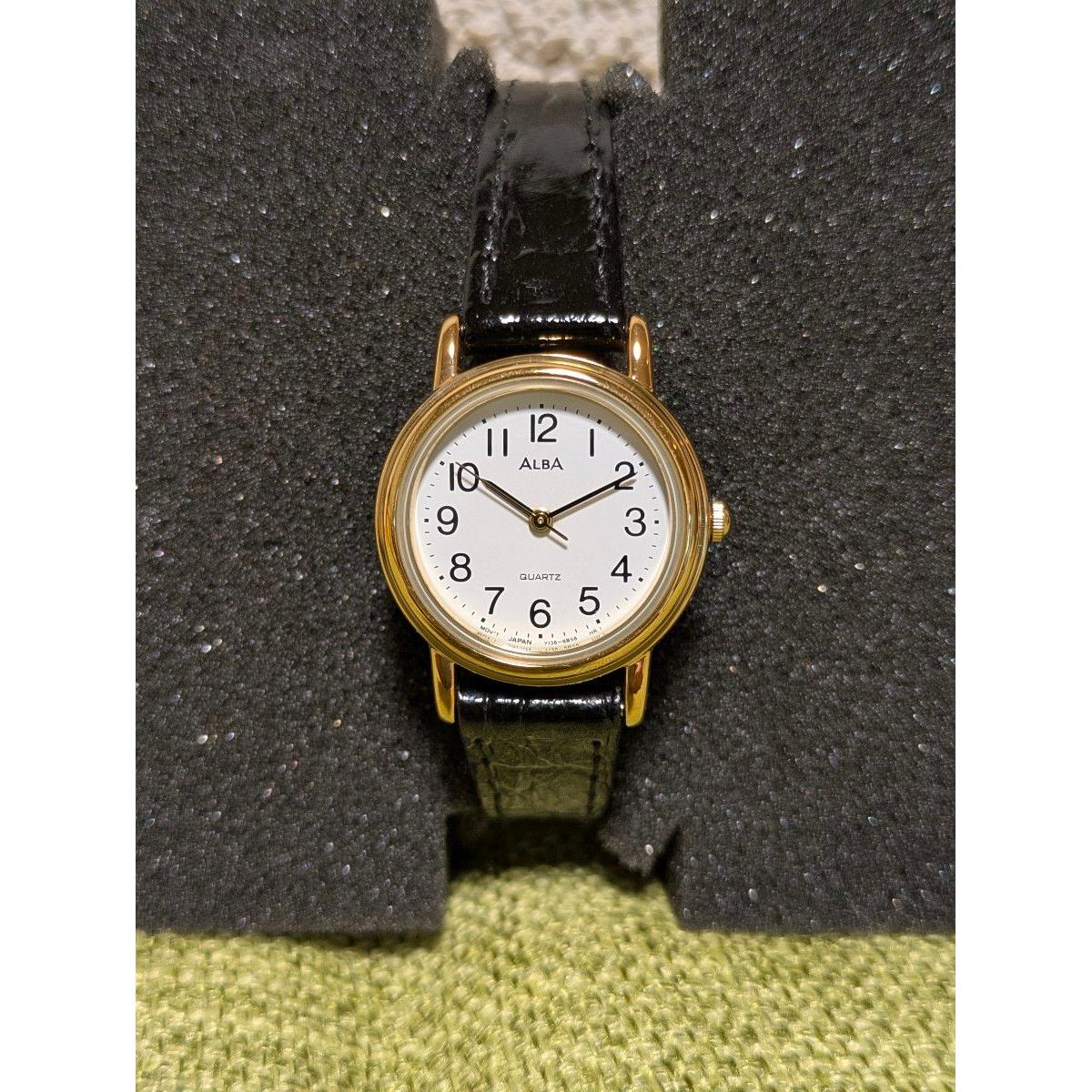 ALBA QUARTZ Ladies Watch Gold Black Strap