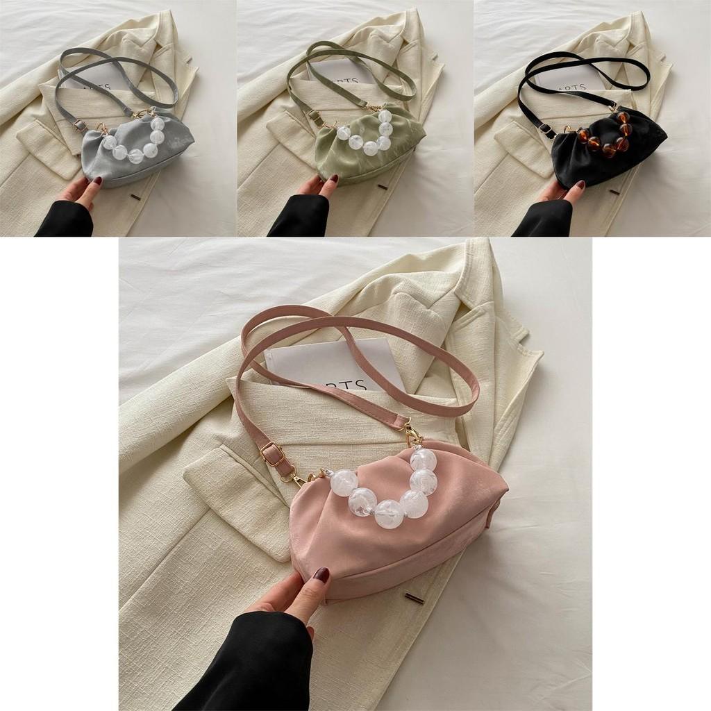 Chic And Versatile Bucket Style Cloud Handbag For Women Featuring Unique Stitching Design