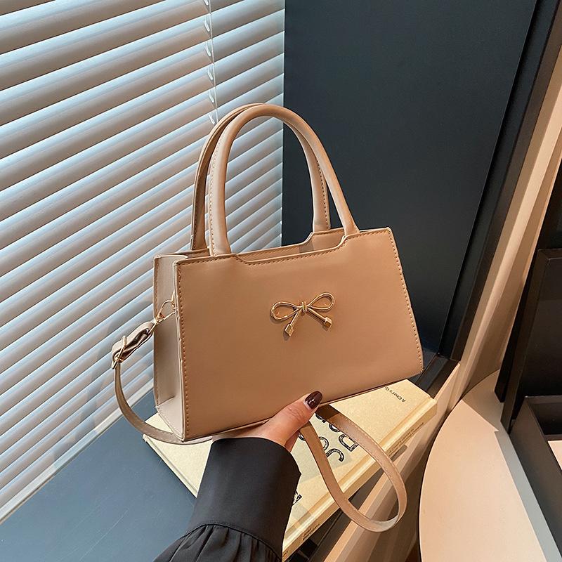 

Bow underarm bag women s 2025 summer new simple foreign style small square bag high texture shoulder messenger bag хакі