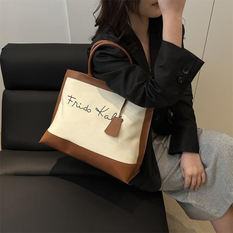 Casual retro high-end portable large-capacity bag women's new trendy fashion contrasting colors commuter hand carry tote bag