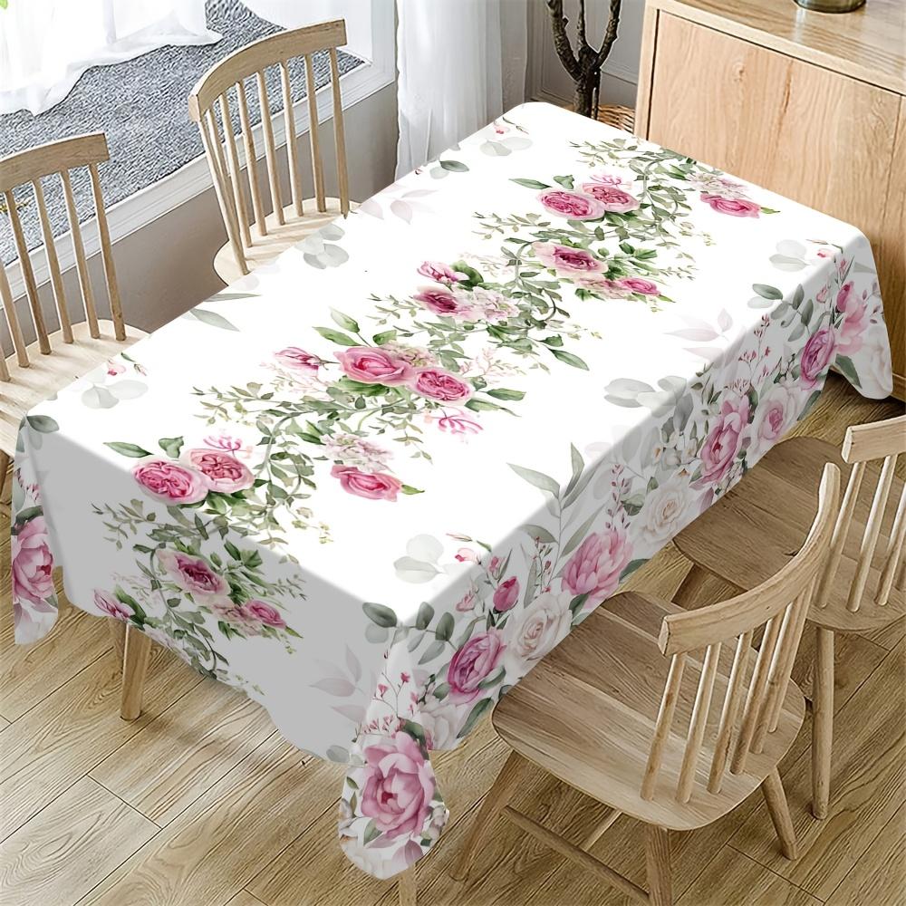 A Rectangular Tablecloth with a Pink Floral Pattern for Spring And Summer, Suitable for Both Indoor And Outdoor Use. It Is Machine Washable And Ideal