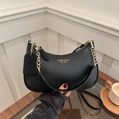 Ležérní stylová taška přes rameno s nastavitelným popruhem, elegantně navržená pro nošení pod paží, vhodná pro volný čas, do práce i na párty.