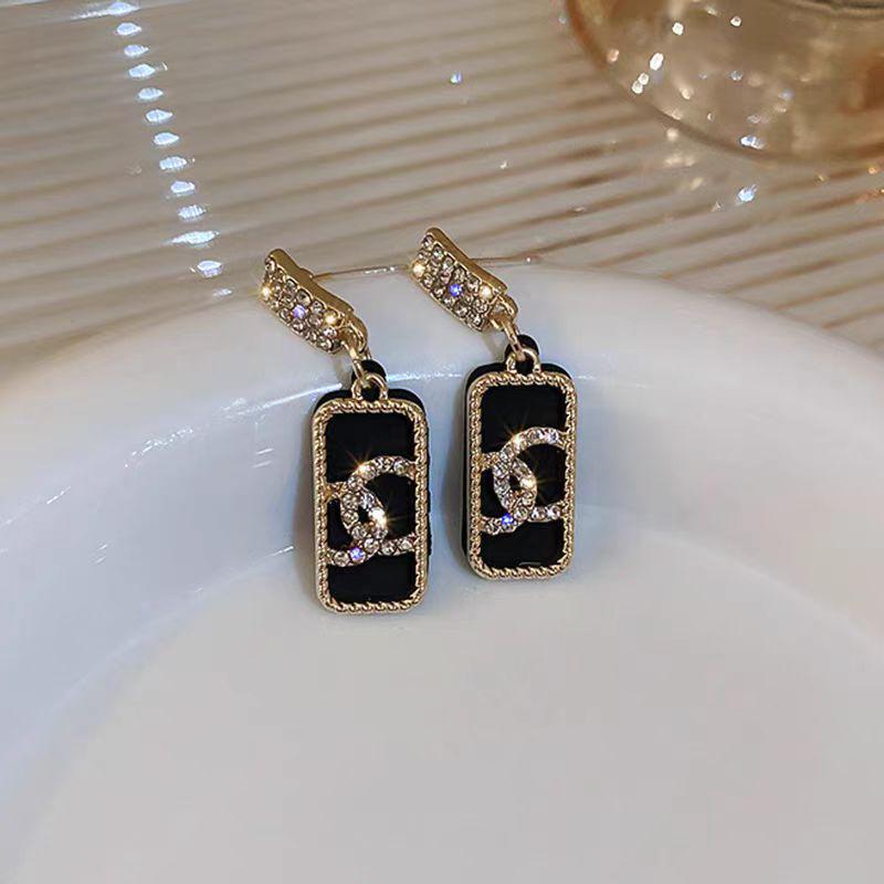 Elegant Gold-Plated Black Zircon Stud Earrings - Niche Design for a Luxurious Fashion Statement