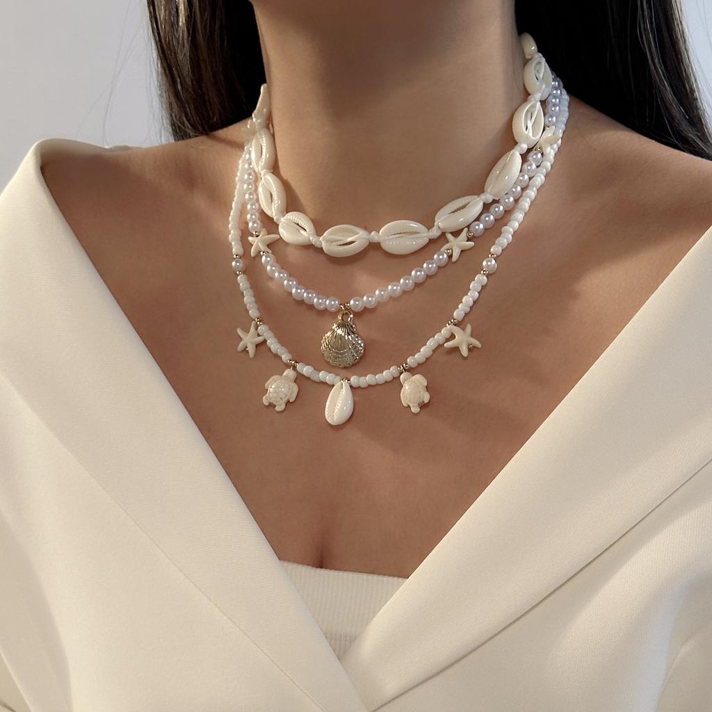 Vacation-style shell and starfish beaded multi-layered necklace, collarbone chain, beach vibe niche accessory