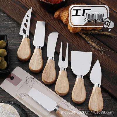 Griff aus Kautschukholz Edelstahl Käse- und Buttermesser