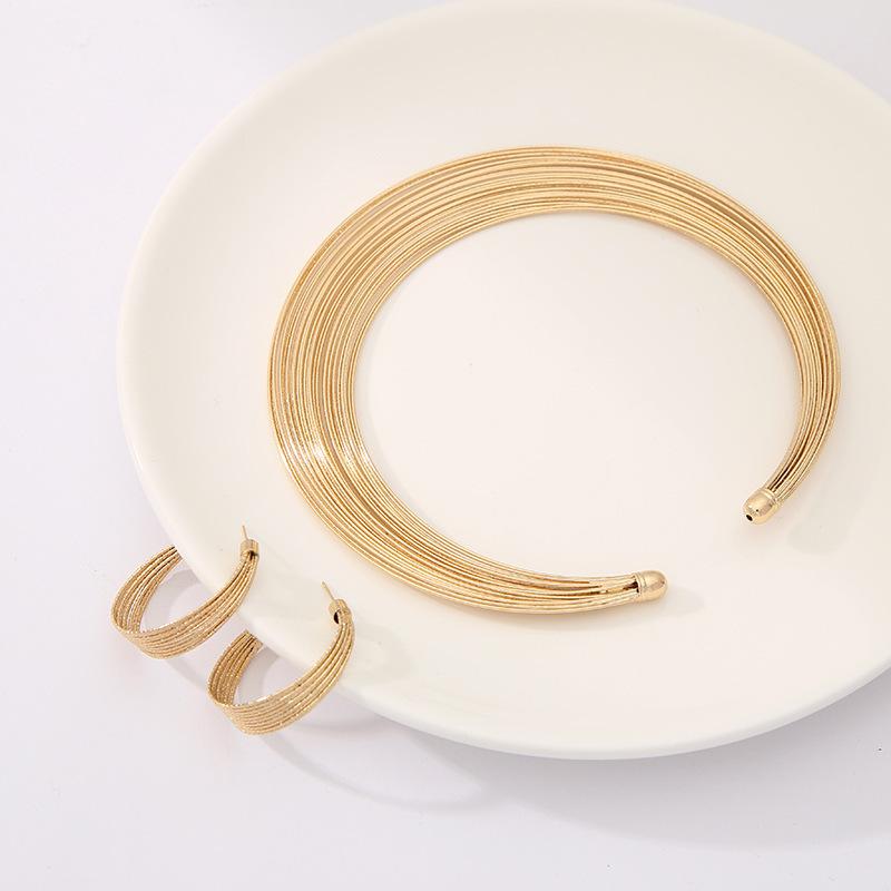 Collana, Bracciale, Orecchini, Anello con Apertura a Vento, Set da Quattro Pezzi, Gioielli da Sposa multistrato in Acciaio di Alta Gamma.