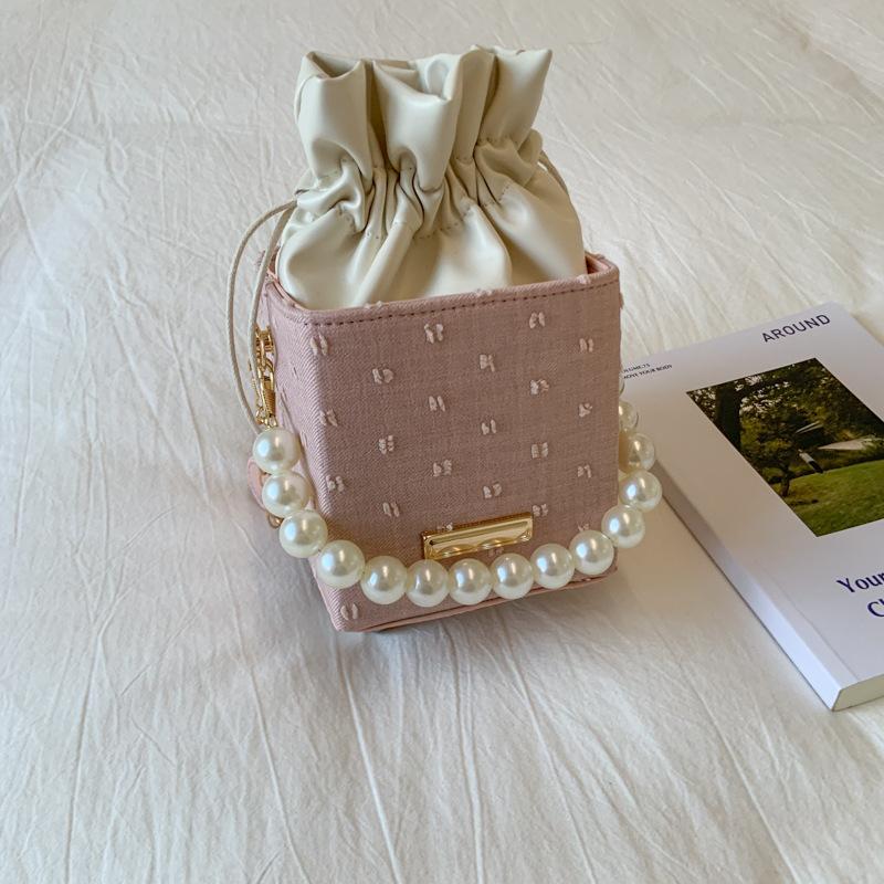 New niche bucket bag trendy personalized high-end messenger bag simple atmosphere pearl portable women's bag