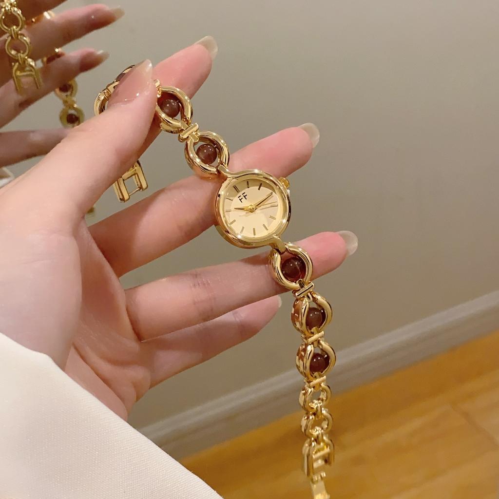 Elegant Round Watch for Women With Sparkling Translucent Stones New High-End Luxury Quartz Watches Gold Bracelet Wristwatches
