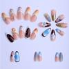 24-piece almond-shaped press-on nails in blue, white, milky white, and coffee color with hand-applied floral embellishments