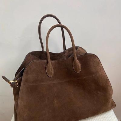 Tragetasche für Damen 2025 Neu Frühling Sommer High-End Nischen-Design Große Kapazität Pendler Vintage Wildleder Handtasche